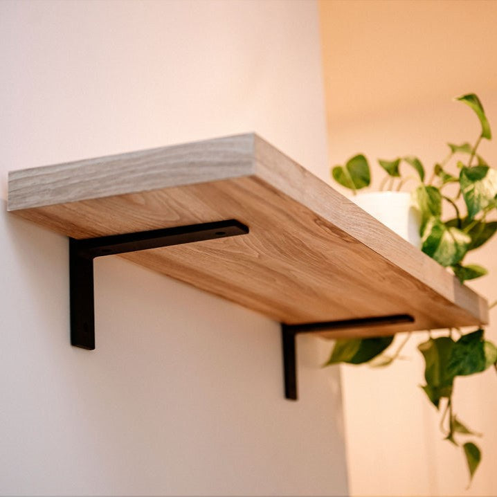 Le support à tablette en métal noir mat